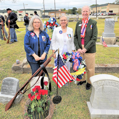 L-R: Jana Marsh of the Sarah Emma Seelye Auxiliary to the Lea Camp, Susan Barry, President of the Houston DUVCW Tent, and Mary Anthony Startz, member of the DUVCW Tent in San Antonio, Texas - posing by the Carter grave after the ceremony.